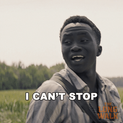 A Man Says " I Can 'T Stop " In Front Of A Poster For The Long Walk GIF