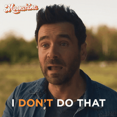 A Man Says I Do N't Do That In Front Of A Sign That Says Moonshine GIF