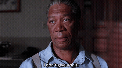 A Man Says " I Don 'T Give A Shit " In Front Of A Door GIF