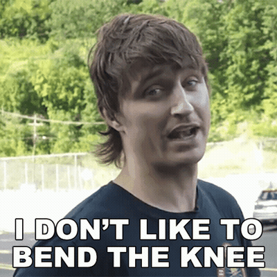 A Man Says " I Don 'T Like To Bend The Knee " While Wearing A Black Shirt GIF