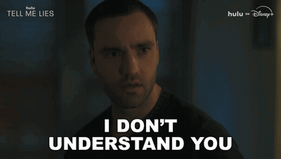 A Man Says " I Don 'T Understand You " In Front Of A Dark Background GIF