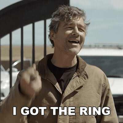 A Man Says I Got The Ring While Giving The Middle Finger GIF