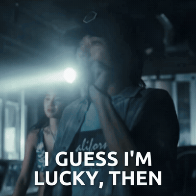 A Man Says I Guess I 'M Lucky Then In A Dark Room GIF