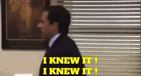 A Man Says I Knew It While Standing In Front Of A Window GIF