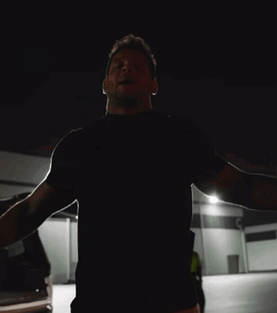 A Man Says I 'M Back Baby In A Dark Room GIF