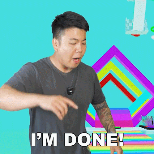 A Man Says I 'M Done With A Colorful Background GIF