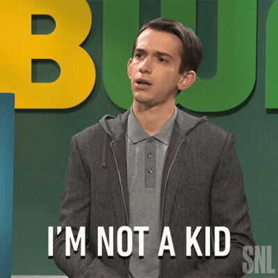 A Man Says I 'M Not A Kid In Front Of A Green Background GIF