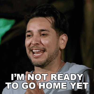 A Man Says I 'M Not Ready To Go Home Yet While Smiling GIF