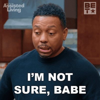 A Man Says " I 'M Not Sure Babe " While Wearing A Black Shirt GIF