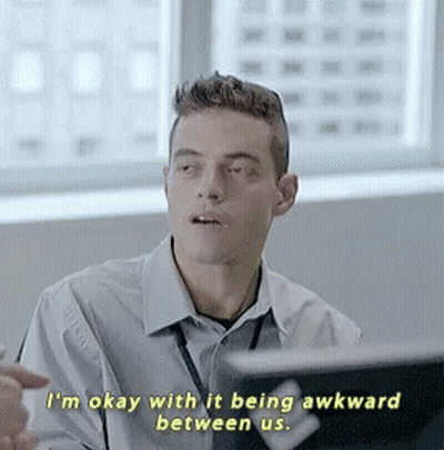 A Man Says I 'M Okay With It Being Awkward Between Us While Looking At A Laptop GIF