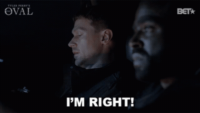 A Man Says I 'M Right Next To Another Man In A Dark Room GIF