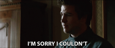 A Man Says I 'M Sorry I Couldn 'T In Front Of A Mirror GIF