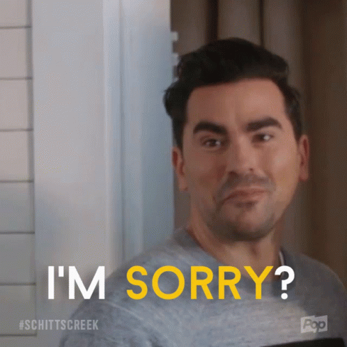 A Man Says I 'M Sorry With A Pop Logo In The Background GIF