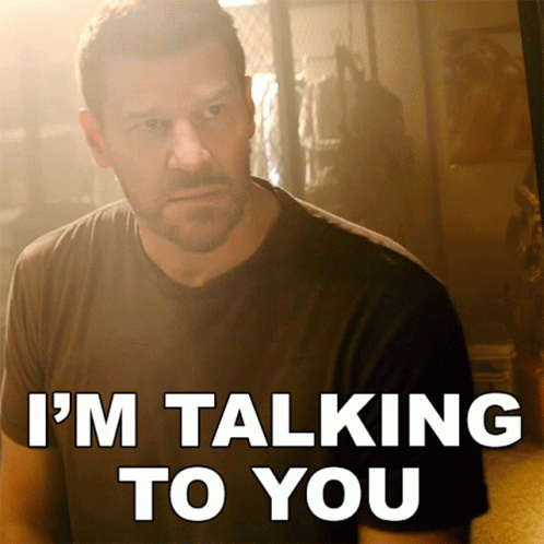 A Man Says I 'M Talking To You In Front Of Him GIF