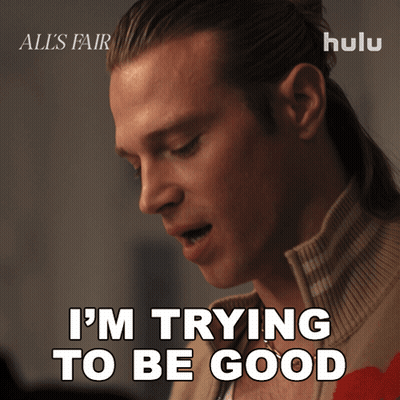 A Man Says " I 'M Trying To Be Good " In Front Of A Hulu Logo GIF
