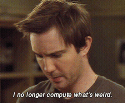 A Man Says " I No Longer Compute What 'S Weird " In A Dark Room GIF