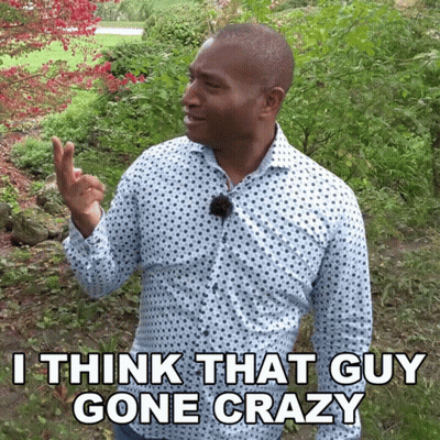 A Man Says I Think That Guy Gone Crazy In A Garden GIF