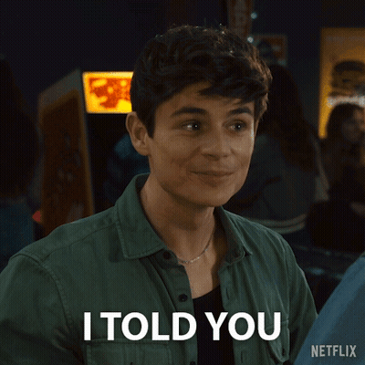 A Man Says I Told You In Front Of An Arcade Machine GIF