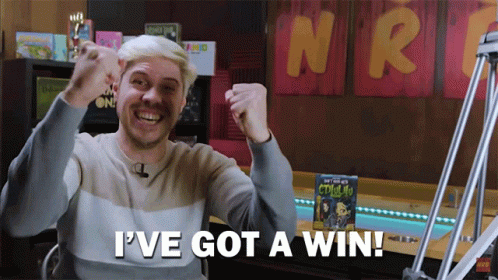 A Man Says I 'Ve Got A Win In Front Of A Sign That Says Nrt GIF