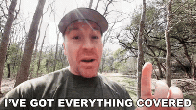 A Man Says I 'Ve Got Everything Covered In Front Of A Forest GIF