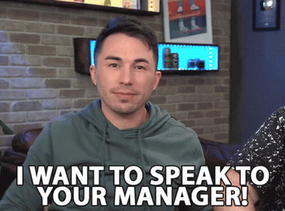 A Man Says " I Want To Speak To Your Manager " In Front Of A Brick Wall GIF
