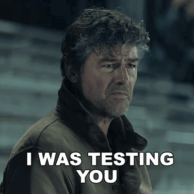 A Man Says I Was Testing You While Looking Down At Something GIF