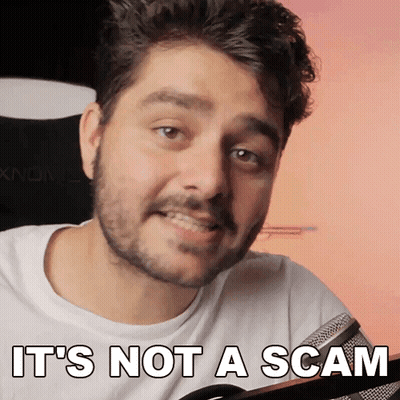 A Man Says It 'S Not A Scam In Front Of A Computer GIF