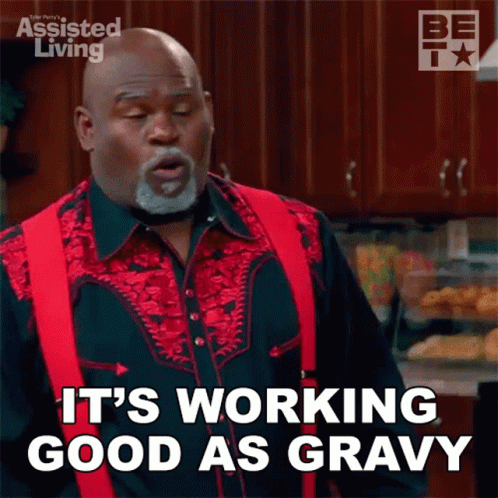 A Man Says It 'S Working Good As Gravy In A Kitchen GIF