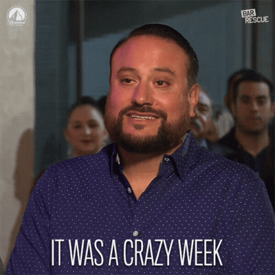 A Man Says It Was A Crazy Week In A Blue Shirt GIF