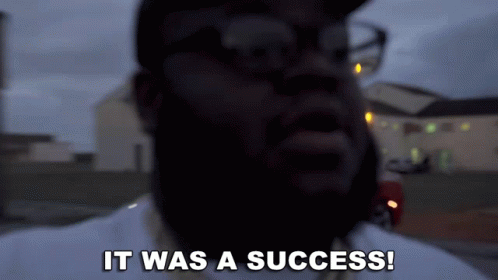 A Man Says It Was A Success In Front Of A House GIF