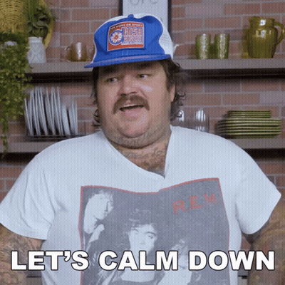 A Man Says Let 'S Calm Down While Wearing A Shirt That Says Rem GIF