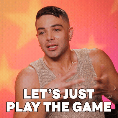 A Man Says " Let 'S Just Play The Game " While Wearing A Gold Tank Top GIF