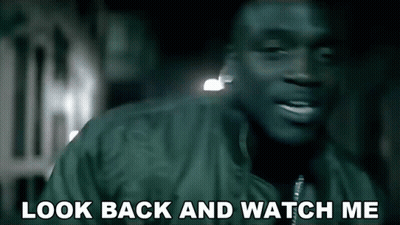 A Man Says Look Back And Watch Me In A Blurry Photo GIF
