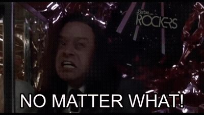 A Man Says No Matter What In Front Of A Sign For Barbie Rockers GIF