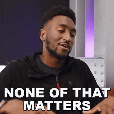 A Man Says " None Of That Matters " In A Purple Room GIF