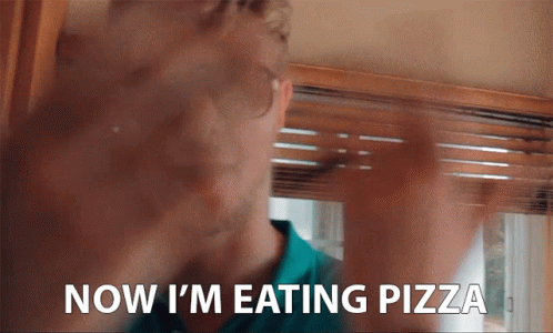 A Man Says " Now I 'M Eating Pizza " While Looking Out A Window GIF