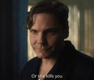 A Man Says " Or She Kills You " In Front Of A Window GIF