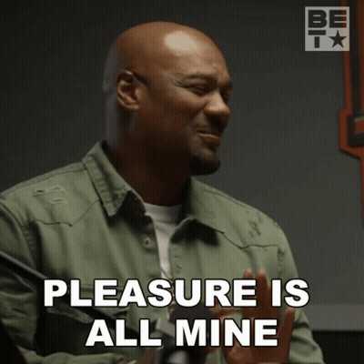 A Man Says " Pleasure Is All Mine " With His Hands Out GIF