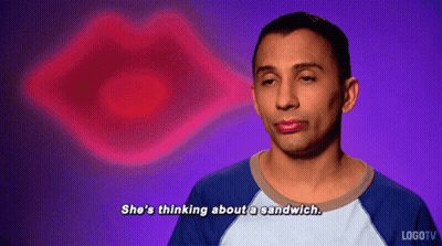 A Man Says She 'S Thinking About A Sandwich In Front Of A Pink Lips GIF