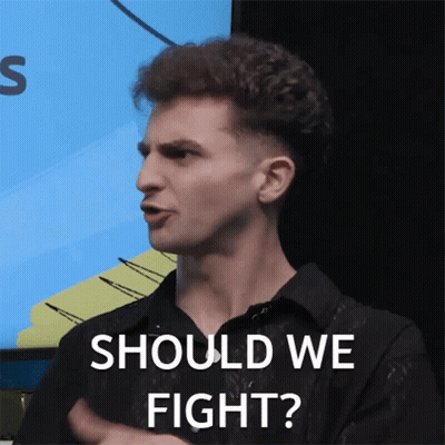 A Man Says Should We Fight In Front Of A Screen GIF