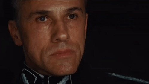 A Man Says " Show Me All Of Your Utxos " In A Dark Room GIF