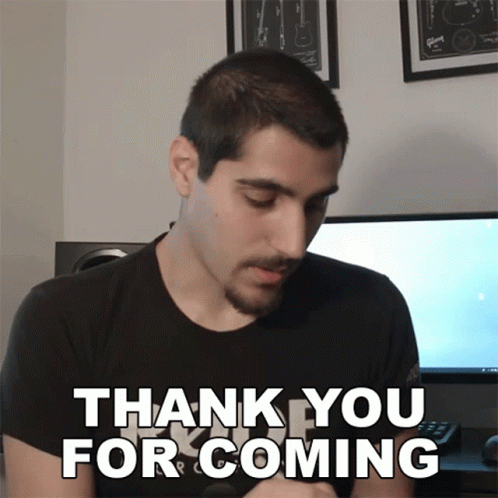 A Man Says Thank You For Coming In Front Of A Computer Monitor GIF