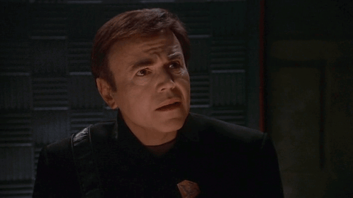 A Man Says That Happens Sometimes In White Letters On A Black Background GIF