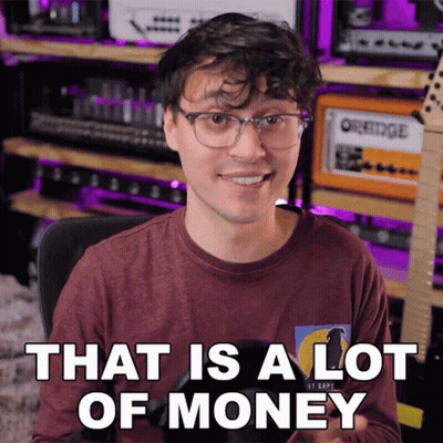 A Man Says That Is A Lot Of Money In Front Of A Guitar GIF