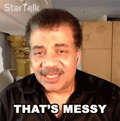 A Man Says That 'S Messy While Wearing Ear Buds GIF