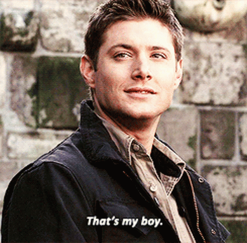 A Man Says That 'S My Boy In Front Of A Brick Wall GIF