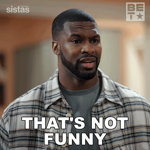 A Man Says That 'S Not Funny In A Plaid Shirt GIF