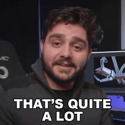 A Man Says That 'S Quite A Lot In Front Of A Computer Monitor GIF