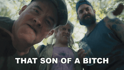 A Man Says That Son Of A Bitch While Standing Next To Two Other Men GIF