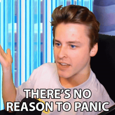 A Man Says There 'S No Reason To Panic While Sitting In Front Of A Computer GIF